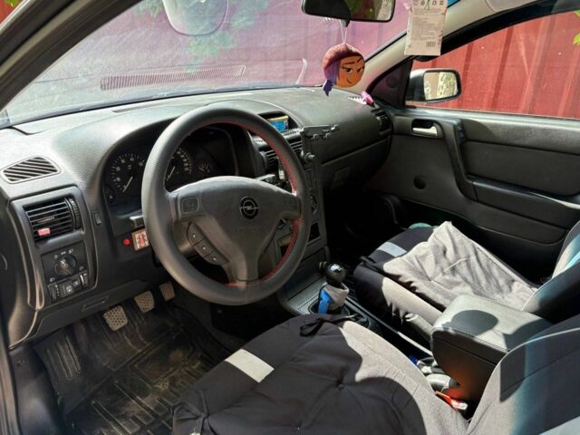 Серый Опель Астра, объемом двигателя 1.4 л и пробегом 201 тыс. км за 3600 $, фото 11 на Automoto.ua