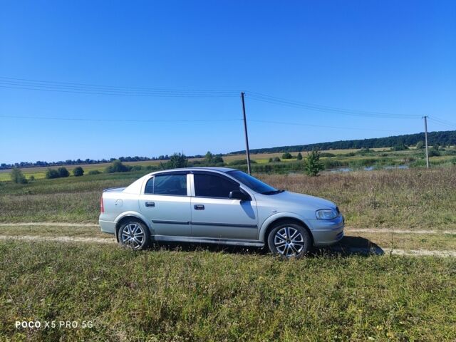 Серый Опель Астра, объемом двигателя 1 л и пробегом 160 тыс. км за 2800 $, фото 3 на Automoto.ua