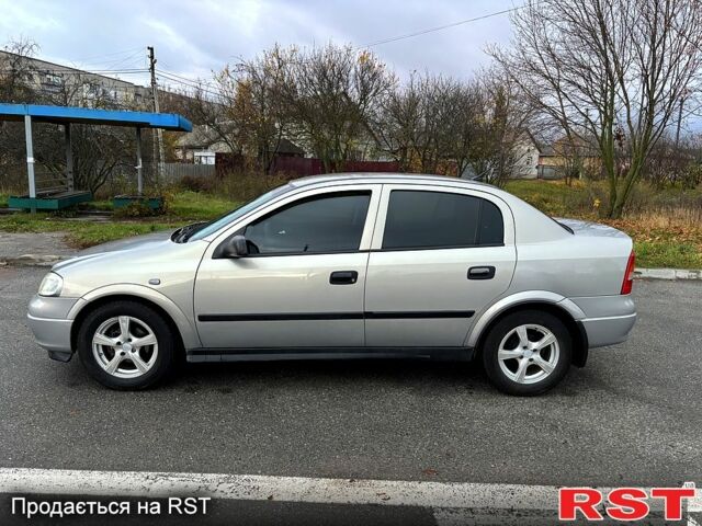 Серый Опель Астра, объемом двигателя 1.4 л и пробегом 201 тыс. км за 3450 $, фото 4 на Automoto.ua