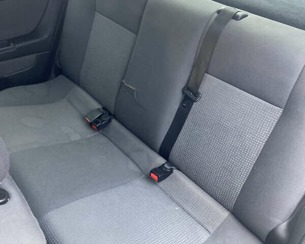 Серый Опель Астра, объемом двигателя 1.4 л и пробегом 104 тыс. км за 3900 $, фото 10 на Automoto.ua