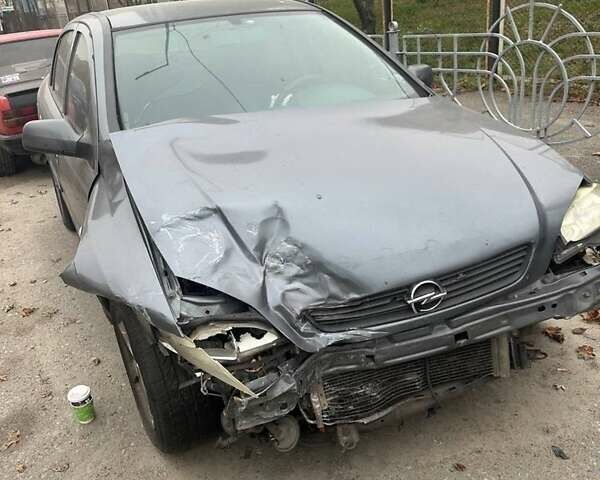 Серый Опель Астра, объемом двигателя 1.4 л и пробегом 410 тыс. км за 2000 $, фото 3 на Automoto.ua