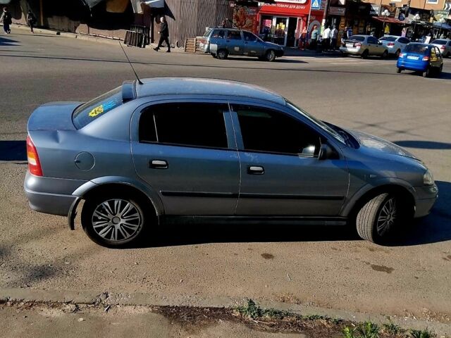 Серый Опель Астра, объемом двигателя 1.4 л и пробегом 235 тыс. км за 2750 $, фото 5 на Automoto.ua