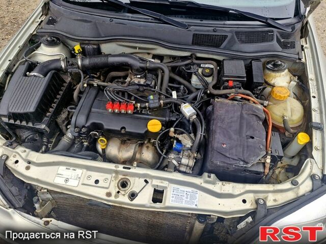 Серый Опель Астра, объемом двигателя 1.4 л и пробегом 183 тыс. км за 4200 $, фото 10 на Automoto.ua