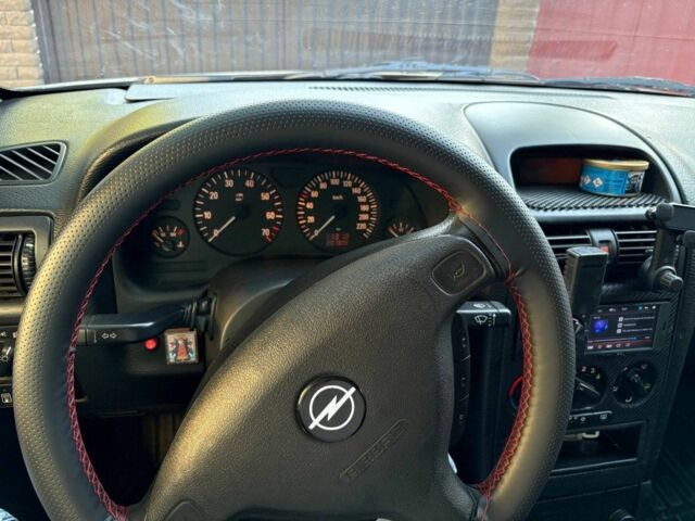 Серый Опель Астра, объемом двигателя 1.4 л и пробегом 201 тыс. км за 3600 $, фото 15 на Automoto.ua