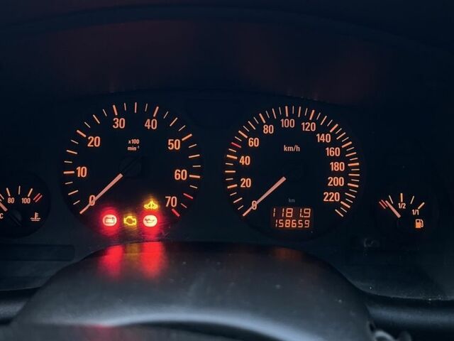 Серый Опель Астра, объемом двигателя 1.4 л и пробегом 158 тыс. км за 3250 $, фото 11 на Automoto.ua