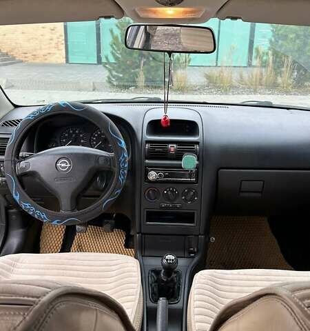 Серый Опель Астра, объемом двигателя 1.6 л и пробегом 179 тыс. км за 4000 $, фото 26 на Automoto.ua