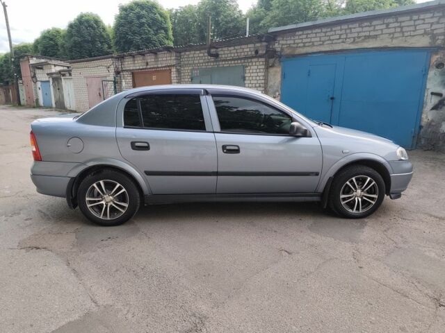 Серый Опель Астра, объемом двигателя 1.4 л и пробегом 73 тыс. км за 5200 $, фото 2 на Automoto.ua