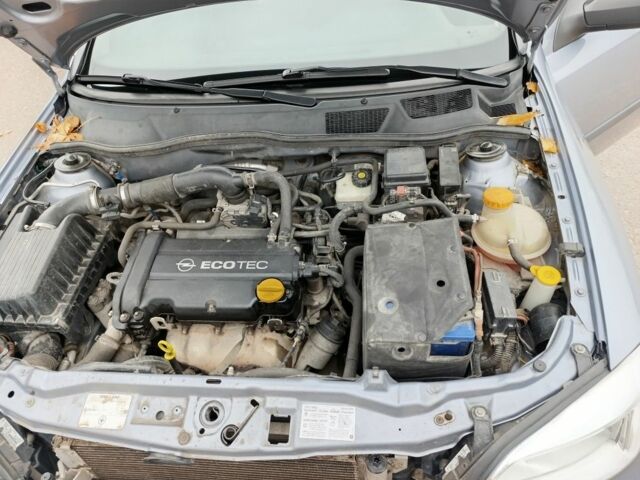 Серый Опель Астра, объемом двигателя 1.4 л и пробегом 77 тыс. км за 4400 $, фото 12 на Automoto.ua