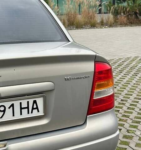 Серый Опель Астра, объемом двигателя 1.6 л и пробегом 179 тыс. км за 4000 $, фото 13 на Automoto.ua