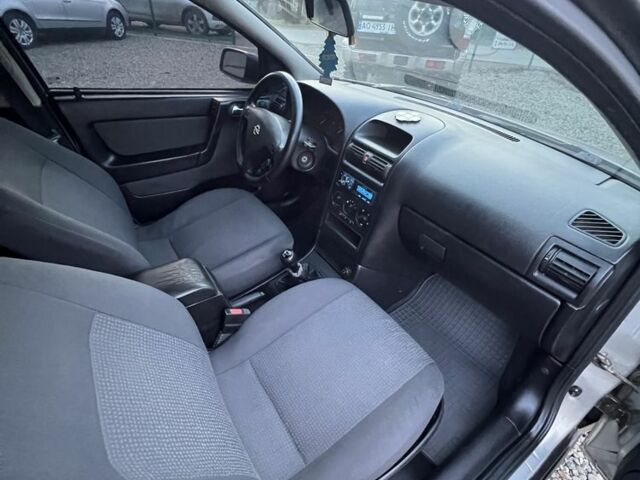 Серый Опель Астра, объемом двигателя 1.4 л и пробегом 158 тыс. км за 3250 $, фото 9 на Automoto.ua