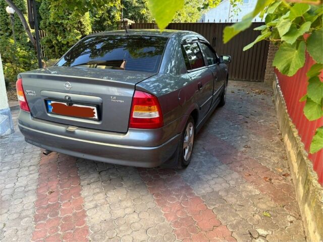 Серый Опель Астра, объемом двигателя 1.4 л и пробегом 201 тыс. км за 3600 $, фото 14 на Automoto.ua