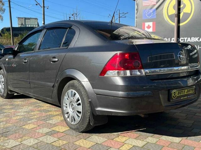 Серый Опель Астра, объемом двигателя 1.6 л и пробегом 212 тыс. км за 5750 $, фото 4 на Automoto.ua