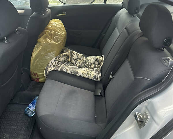 Серый Опель Астра, объемом двигателя 1.6 л и пробегом 168 тыс. км за 4599 $, фото 24 на Automoto.ua