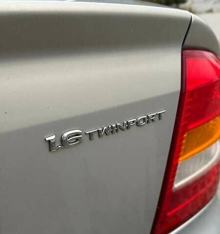 Серый Опель Астра, объемом двигателя 1.6 л и пробегом 179 тыс. км за 4000 $, фото 16 на Automoto.ua