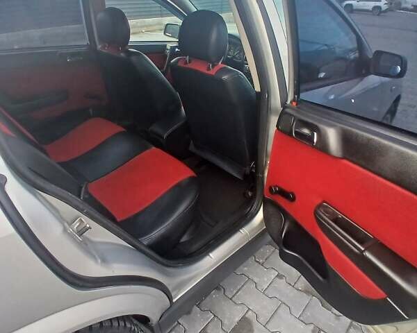 Серый Опель Астра, объемом двигателя 1.6 л и пробегом 98 тыс. км за 4500 $, фото 19 на Automoto.ua