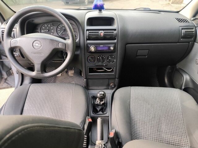 Серый Опель Астра, объемом двигателя 1.4 л и пробегом 73 тыс. км за 5200 $, фото 6 на Automoto.ua