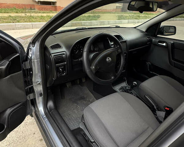 Серый Опель Астра, объемом двигателя 1.6 л и пробегом 113 тыс. км за 5500 $, фото 8 на Automoto.ua