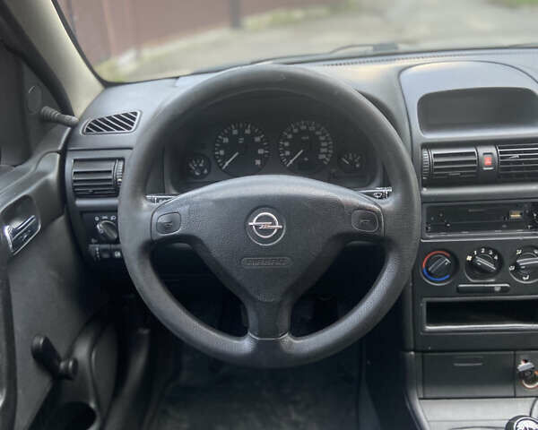 Серый Опель Астра, объемом двигателя 1.4 л и пробегом 104 тыс. км за 3900 $, фото 17 на Automoto.ua