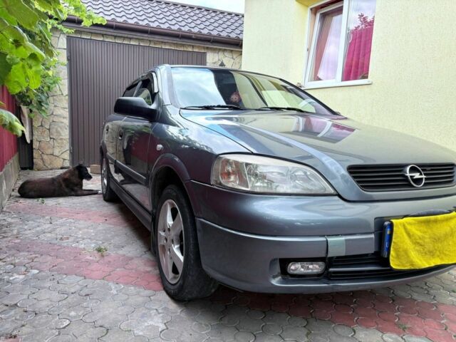 Серый Опель Астра, объемом двигателя 1.4 л и пробегом 201 тыс. км за 3600 $, фото 4 на Automoto.ua