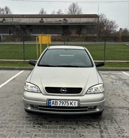 Серый Опель Астра, объемом двигателя 1.6 л и пробегом 47 тыс. км за 5900 $, фото 2 на Automoto.ua