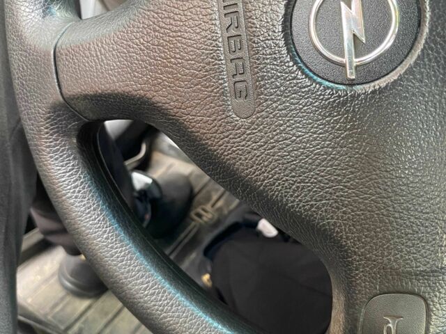 Серый Опель Астра, объемом двигателя 1.4 л и пробегом 100 тыс. км за 4700 $, фото 6 на Automoto.ua