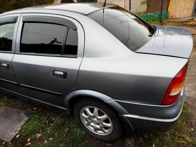 Серый Опель Астра, объемом двигателя 1.6 л и пробегом 256 тыс. км за 3500 $, фото 9 на Automoto.ua