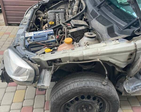 Серый Опель Астра, объемом двигателя 1.4 л и пробегом 122 тыс. км за 1500 $, фото 10 на Automoto.ua