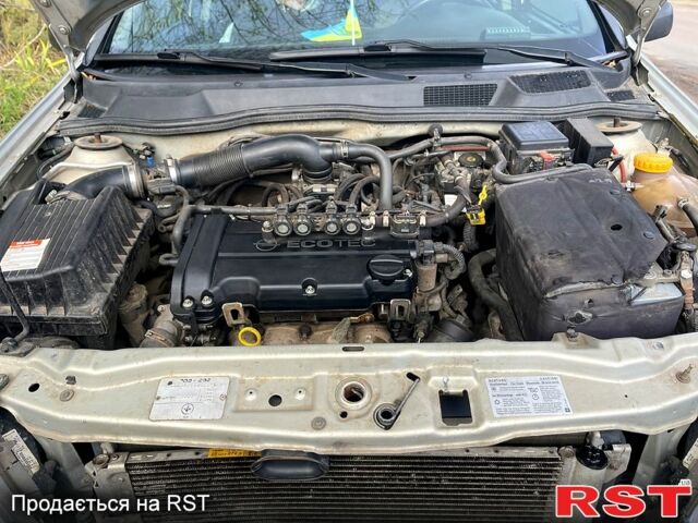 Серый Опель Астра, объемом двигателя 1.4 л и пробегом 326 тыс. км за 4200 $, фото 9 на Automoto.ua