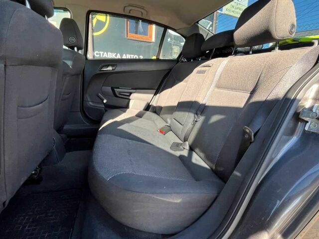 Серый Опель Астра, объемом двигателя 1.6 л и пробегом 212 тыс. км за 5750 $, фото 17 на Automoto.ua