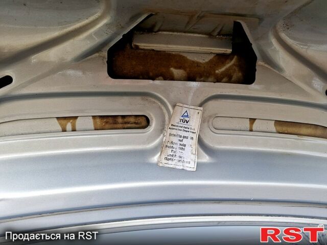 Серый Опель Астра, объемом двигателя 1.4 л и пробегом 183 тыс. км за 4200 $, фото 9 на Automoto.ua