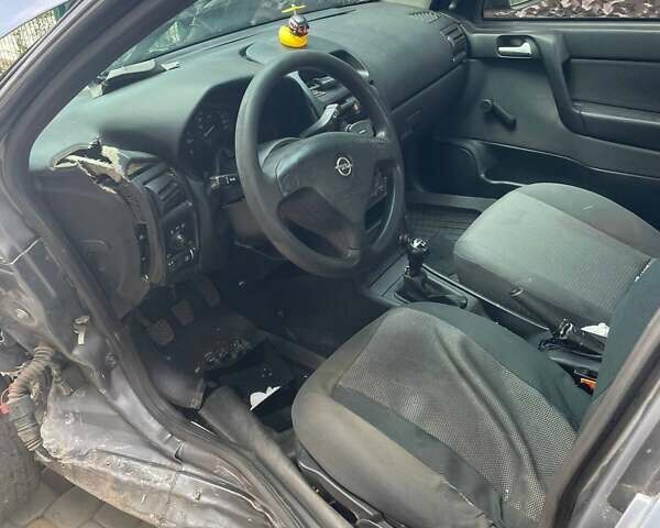 Серый Опель Астра, объемом двигателя 1.4 л и пробегом 122 тыс. км за 1500 $, фото 24 на Automoto.ua