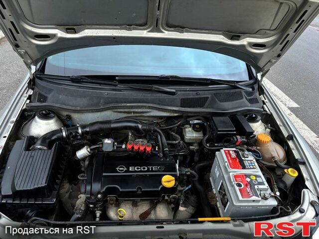 Серый Опель Астра, объемом двигателя 1.4 л и пробегом 201 тыс. км за 3450 $, фото 13 на Automoto.ua