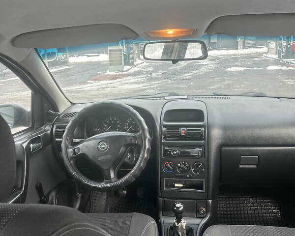 Сірий Опель Астра, об'ємом двигуна 1.4 л та пробігом 200 тис. км за 2849 $, фото 12 на Automoto.ua