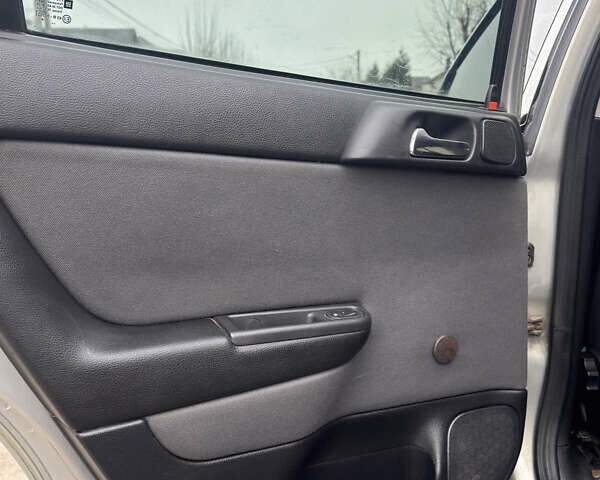 Сірий Опель Астра, об'ємом двигуна 1.4 л та пробігом 218 тис. км за 4000 $, фото 21 на Automoto.ua