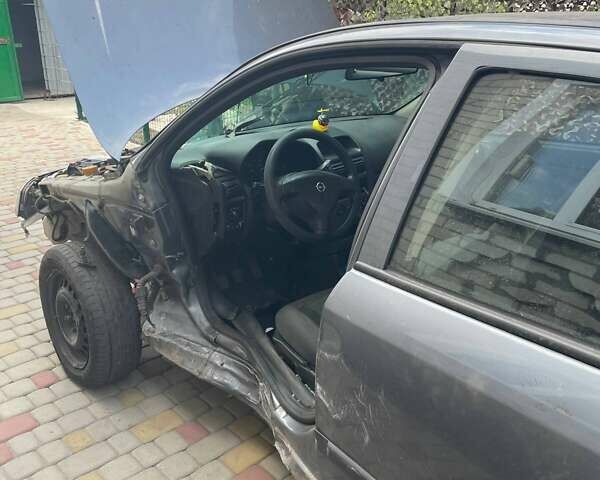 Серый Опель Астра, объемом двигателя 1.4 л и пробегом 122 тыс. км за 1500 $, фото 14 на Automoto.ua