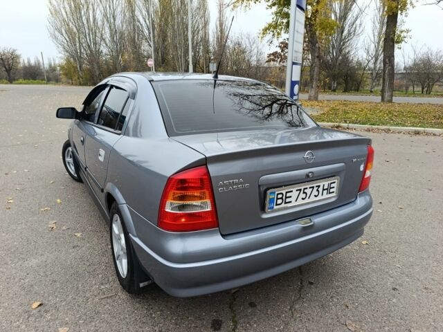 Серый Опель Астра, объемом двигателя 1.4 л и пробегом 77 тыс. км за 4400 $, фото 8 на Automoto.ua