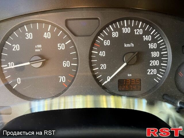 Серый Опель Астра, объемом двигателя 1.4 л и пробегом 326 тыс. км за 4200 $, фото 7 на Automoto.ua