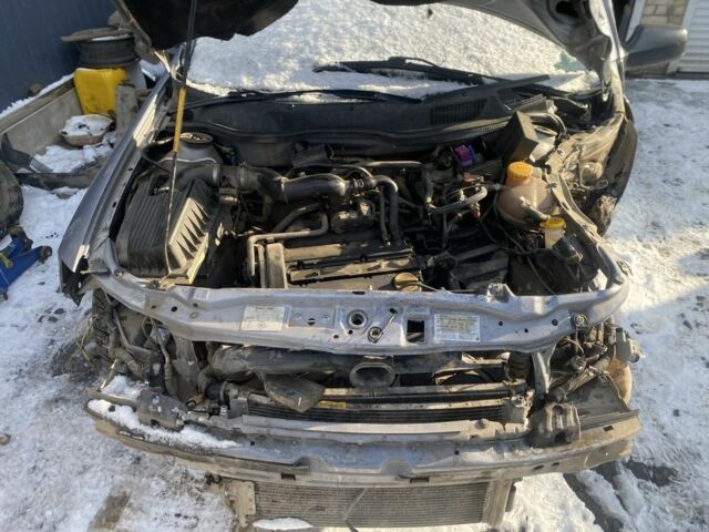 Серый Опель Астра, объемом двигателя 1.4 л и пробегом 250 тыс. км за 1299 $, фото 4 на Automoto.ua