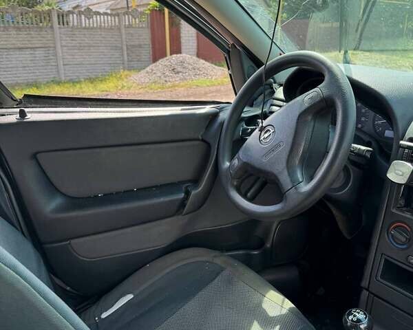 Серый Опель Астра, объемом двигателя 1.4 л и пробегом 122 тыс. км за 1500 $, фото 15 на Automoto.ua