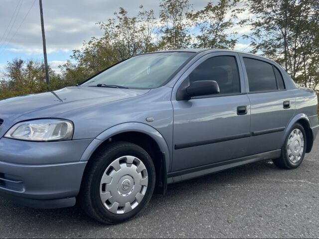 Серый Опель Астра, объемом двигателя 1.6 л и пробегом 200 тыс. км за 4200 $, фото 1 на Automoto.ua