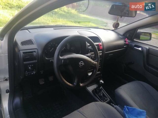 Серый Опель Астра, объемом двигателя 1.4 л и пробегом 115 тыс. км за 4800 $, фото 2 на Automoto.ua