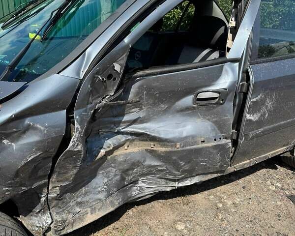 Серый Опель Астра, объемом двигателя 1.4 л и пробегом 122 тыс. км за 1500 $, фото 4 на Automoto.ua