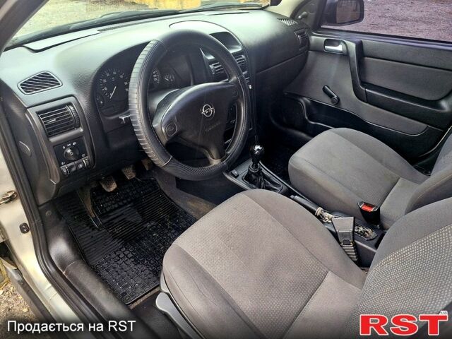 Серый Опель Астра, объемом двигателя 1.4 л и пробегом 183 тыс. км за 4200 $, фото 7 на Automoto.ua