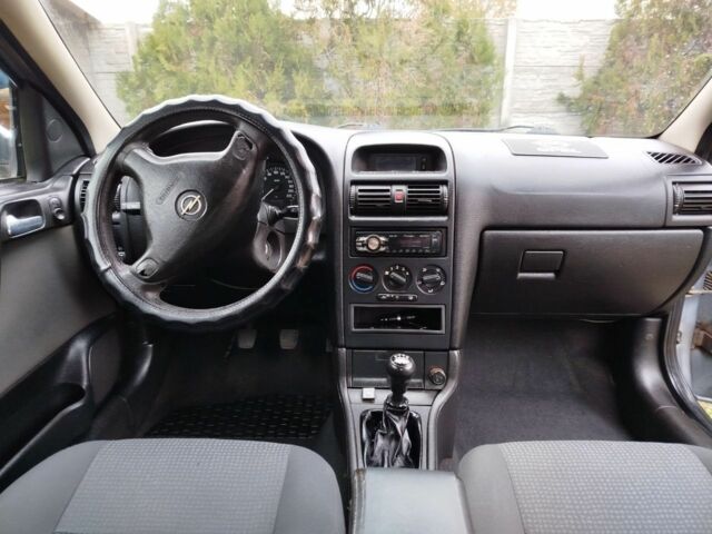 Серый Опель Астра, объемом двигателя 1.6 л и пробегом 256 тыс. км за 3500 $, фото 4 на Automoto.ua