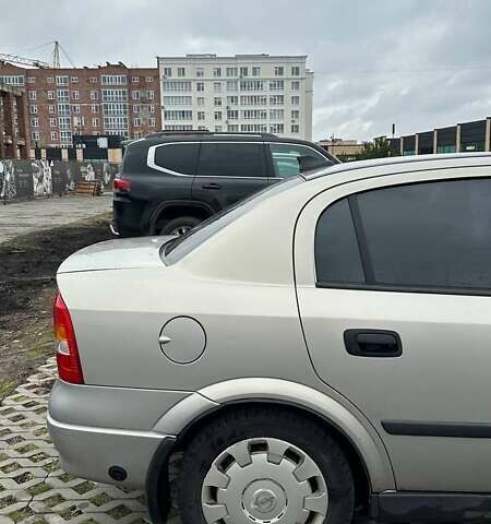 Серый Опель Астра, объемом двигателя 1.6 л и пробегом 179 тыс. км за 4000 $, фото 4 на Automoto.ua