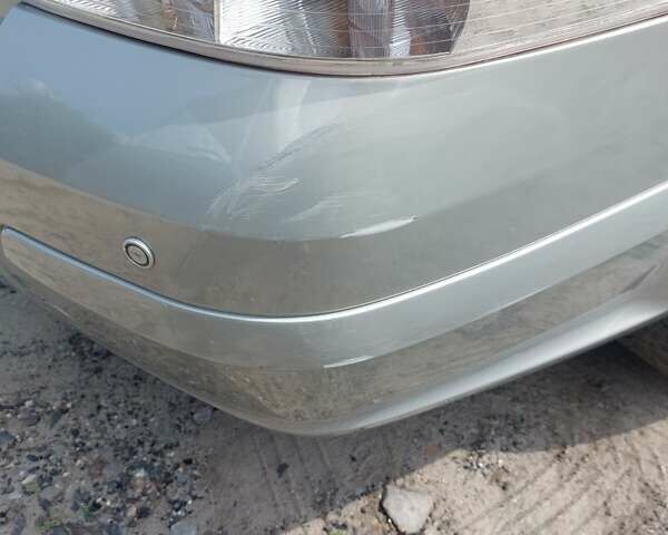 Серый Опель Астра, объемом двигателя 1.8 л и пробегом 286 тыс. км за 6000 $, фото 5 на Automoto.ua