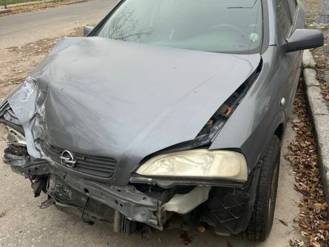 Серый Опель Астра, объемом двигателя 1.4 л и пробегом 410 тыс. км за 2000 $, фото 2 на Automoto.ua