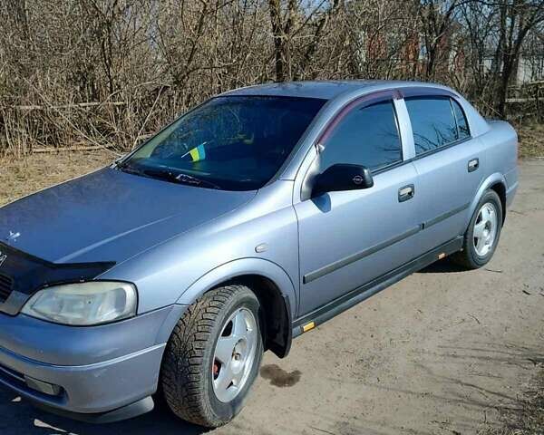 Серый Опель Астра, объемом двигателя 1.4 л и пробегом 213 тыс. км за 3700 $, фото 1 на Automoto.ua