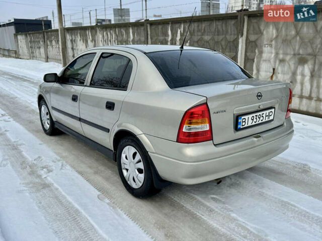 Серый Опель Астра, объемом двигателя 1.4 л и пробегом 220 тыс. км за 3750 $, фото 12 на Automoto.ua