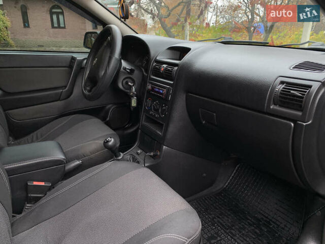 Опель Астра 2008 у Червоноград на Automoto.ua Сірий Опель Астра, об'ємом двигуна 1.6 л та пробігом 193 тис. км за 5300 $, фото 11 на Automoto.ua